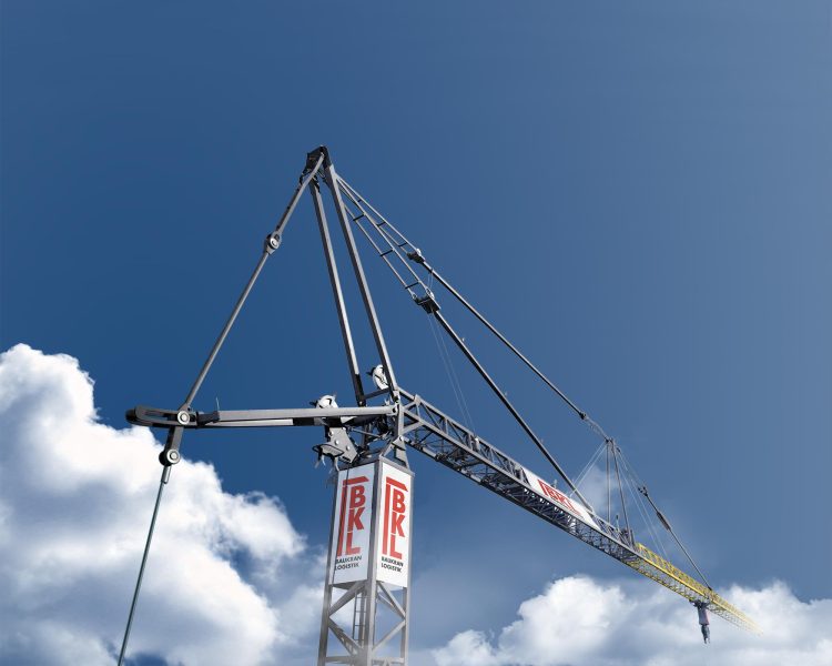 BKL tower crane with a long jib and the BKL Baukran Logistik logo against a blue sky. Buy this crane from BKL